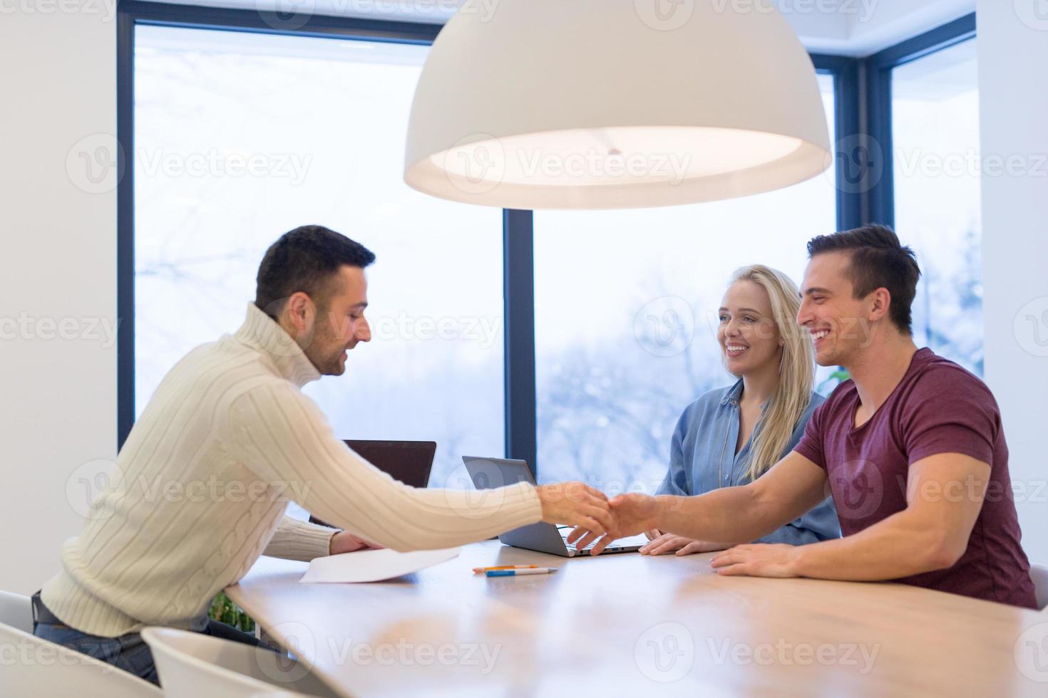 Startup Business Team At A Meeting at modern office building photo