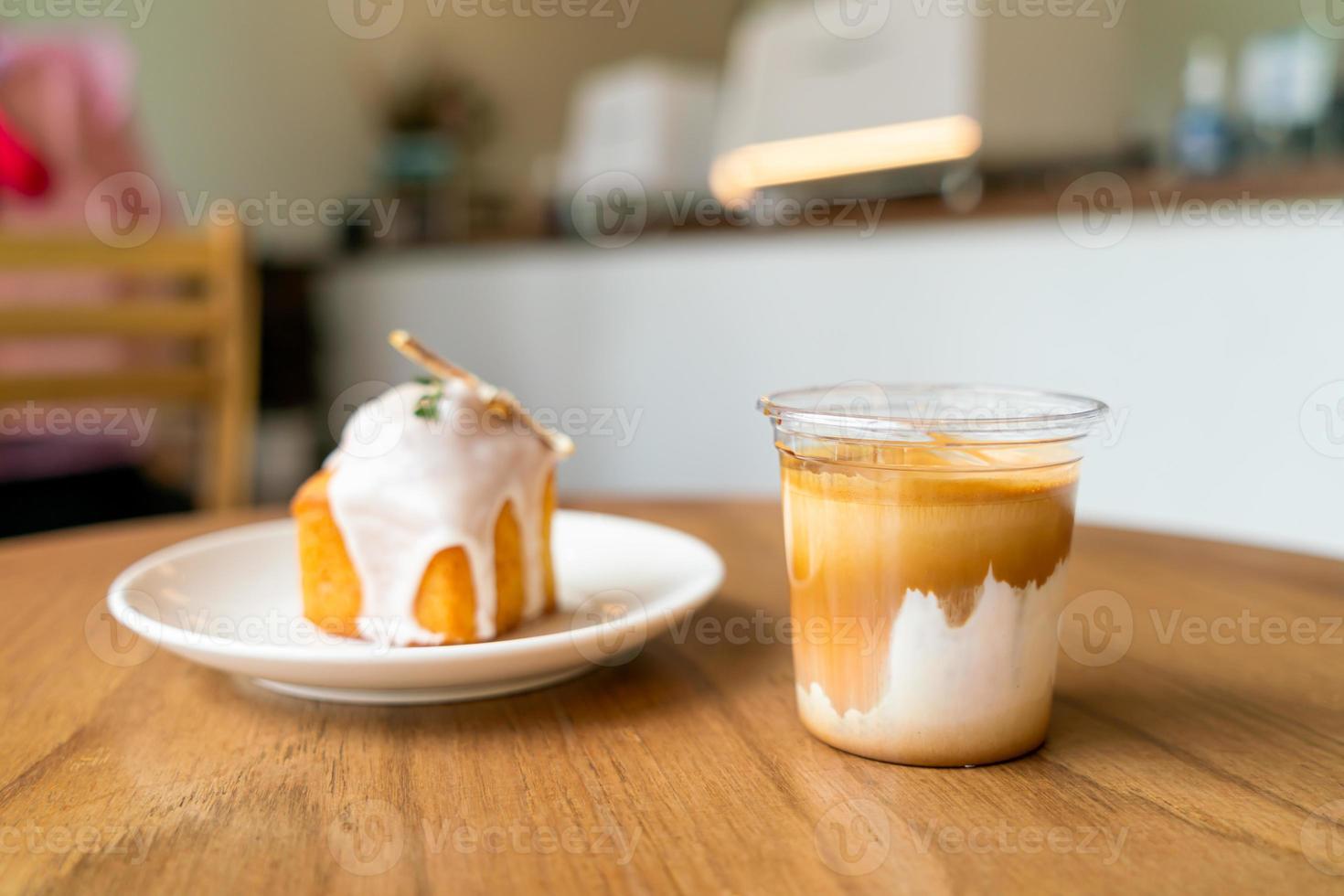 Dirty Coffee - A glass of espresso shot mixed with cold fresh milk photo