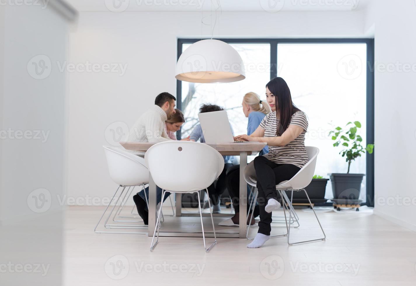 Startup Business Team At A Meeting at modern office building photo