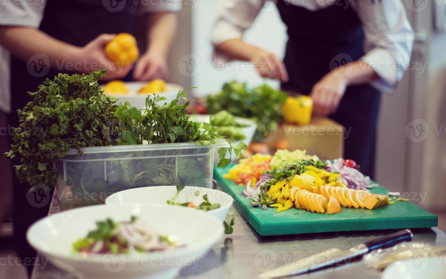 team cooks and chefs preparing meals photo
