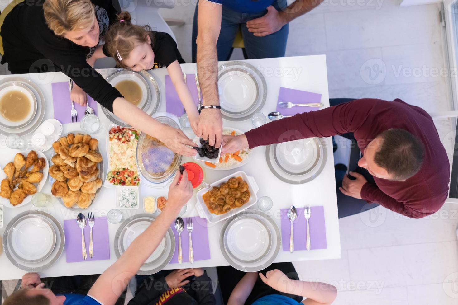 iftar dinner muslim family together during a ramadan feast at home top view photo