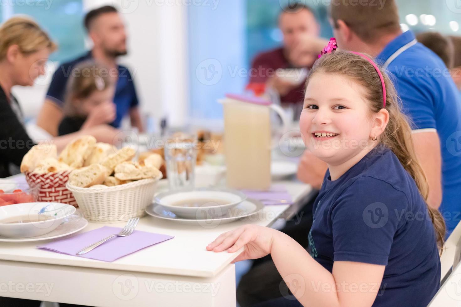 Eid Mubarak islamic family have Iftar dinner during Ramadan fest photo