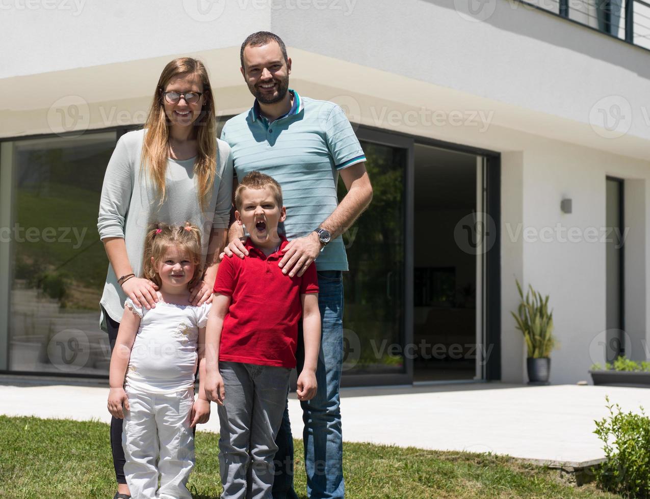 happy family with children in the yard photo