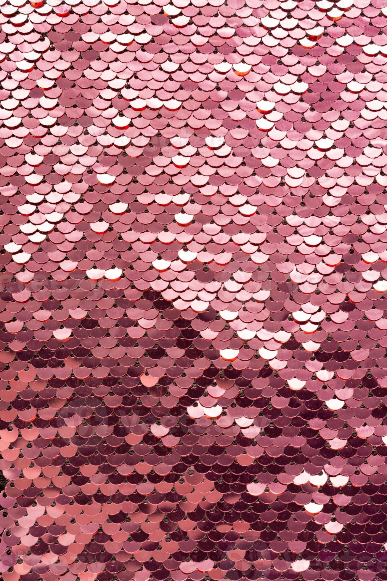 Sequins background. Multicolored sequins. Background with shiny sequins