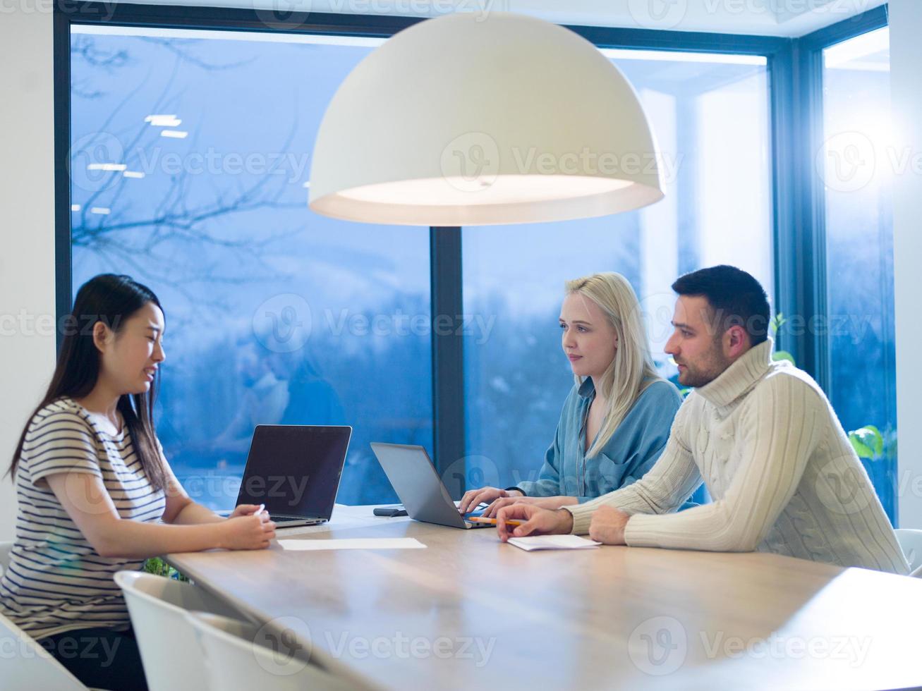 Startup business team at a meeting in modern office building photo
