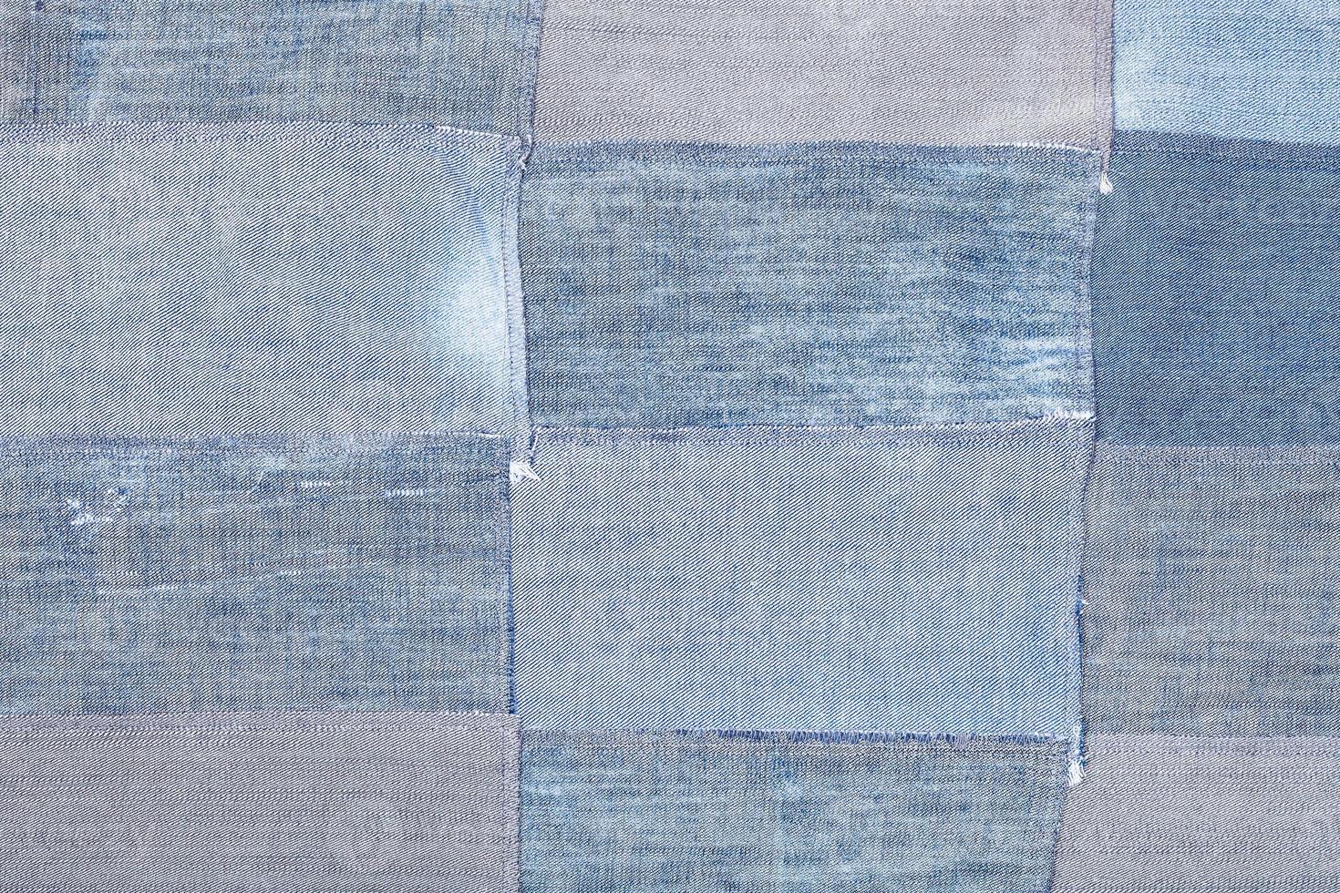 patchwork from old blue denim flaps photo