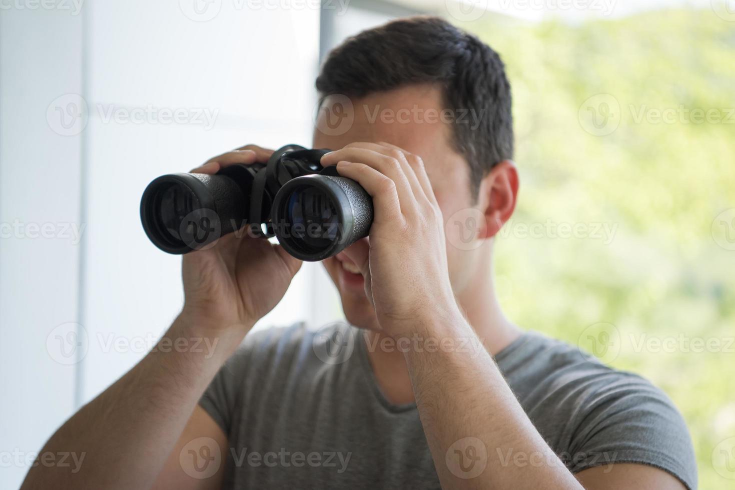 Man with binoculars photo