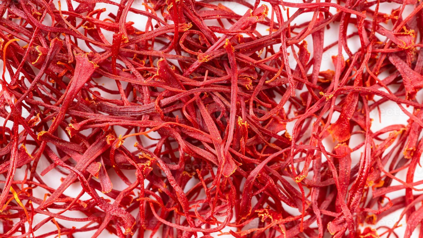 many natural crocus saffron threads photo