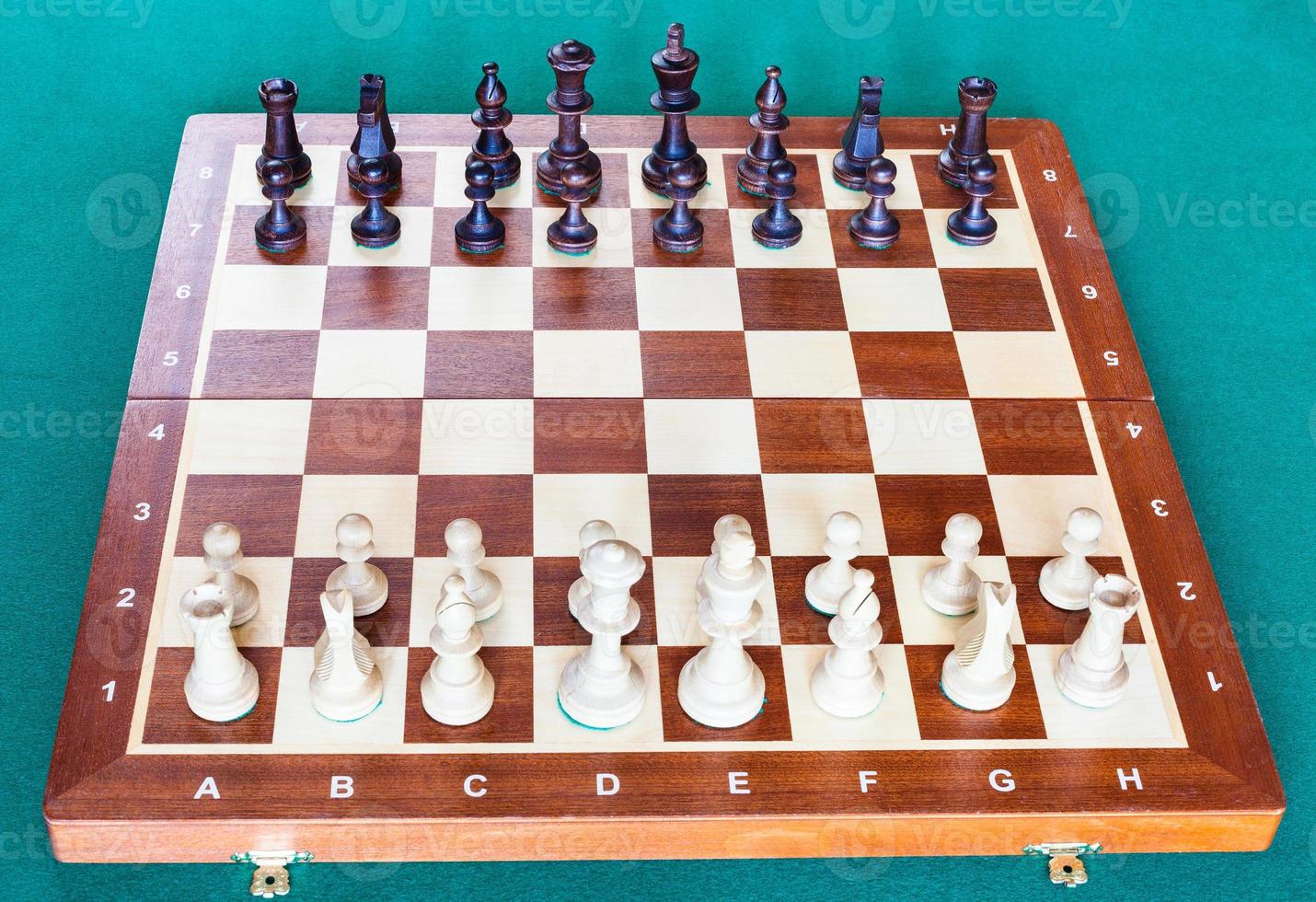 view from white side of chessboard with chess photo