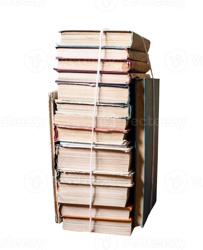 stack of used books tied with packthread isolated photo