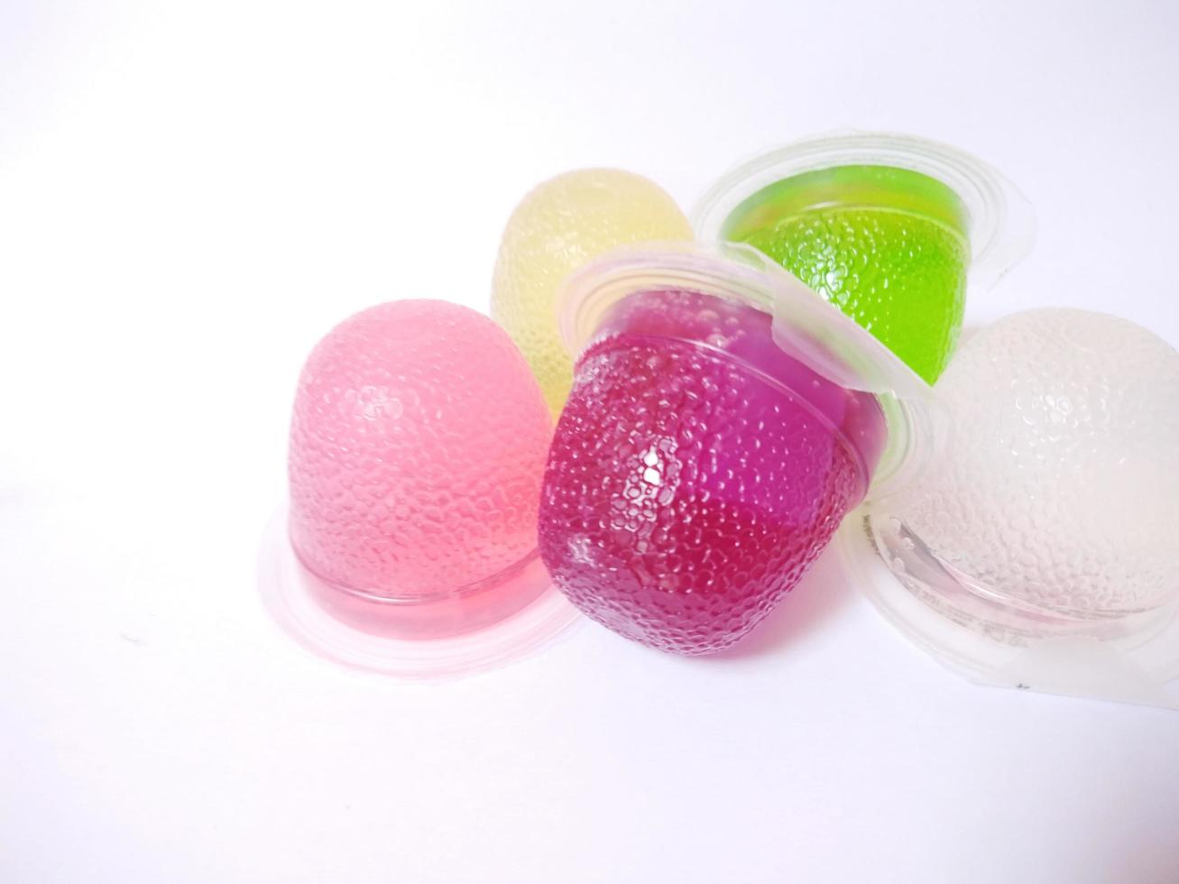 jelly color purple, green, white, pink, yellow. isolated on a white background. close up. photo