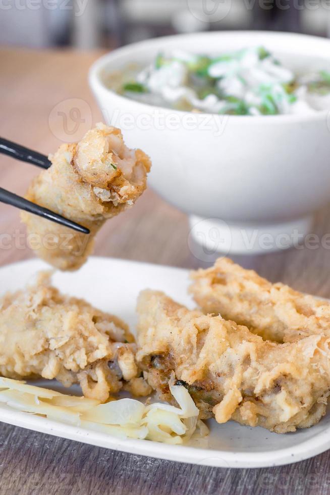 Fried shrimp roll - Taiwanese food cuisine in Tainan, Taiwan restaurant, close up, lifestyle. photo