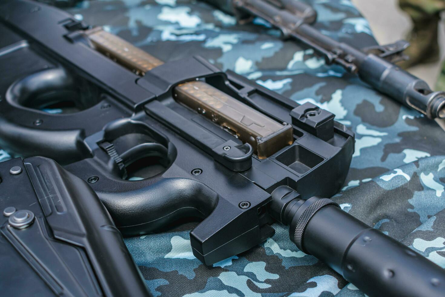 Automatic weapons on a table for a close-up demonstration photo