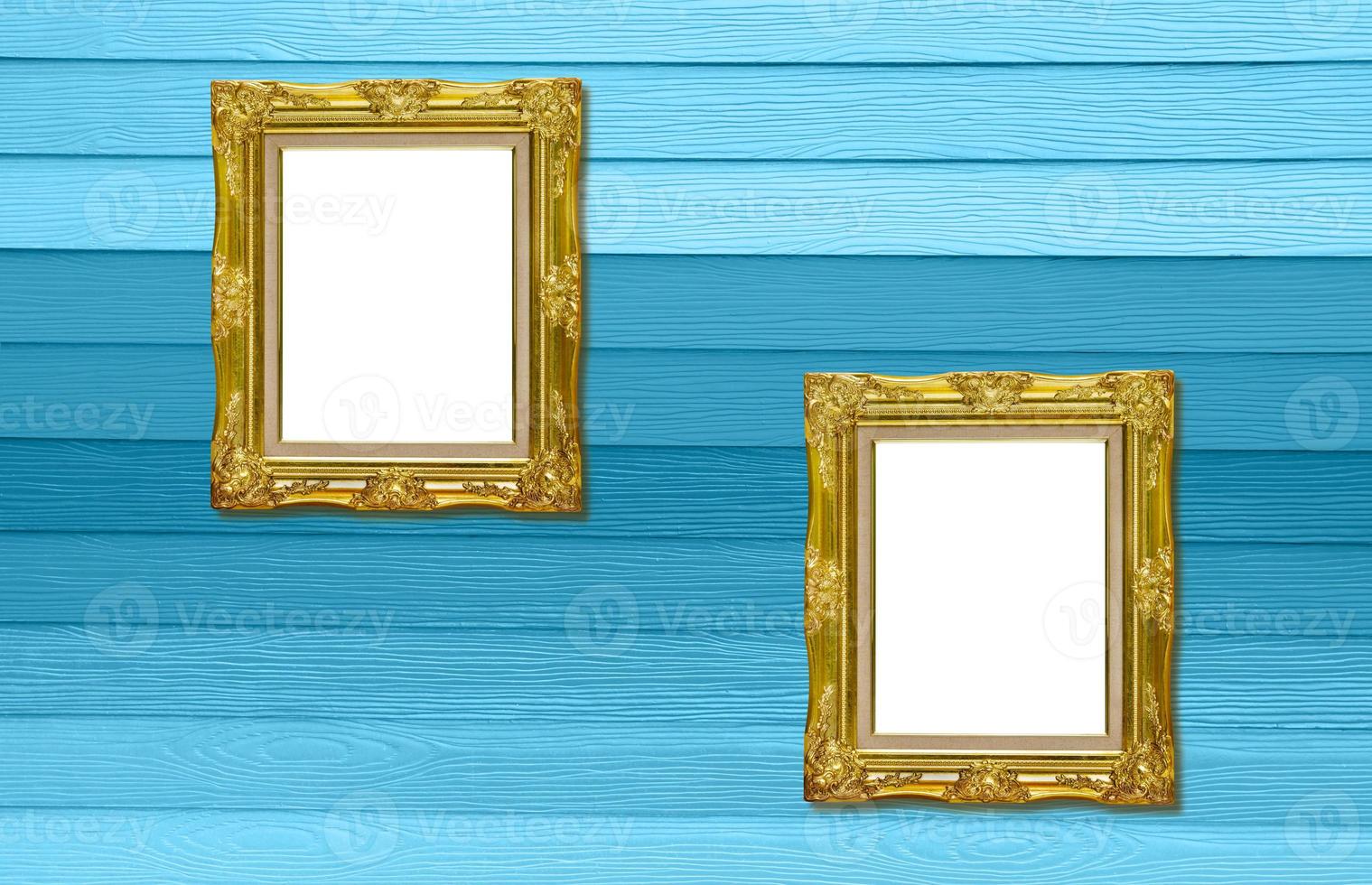 twain antique golden picture frame on wood texture photo