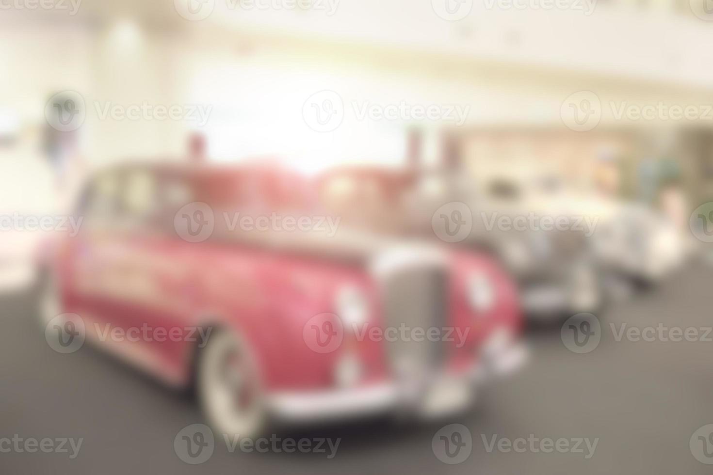 Fondo borroso de la sala de exposición de coches antiguos, imagen borrosa abstracta foto