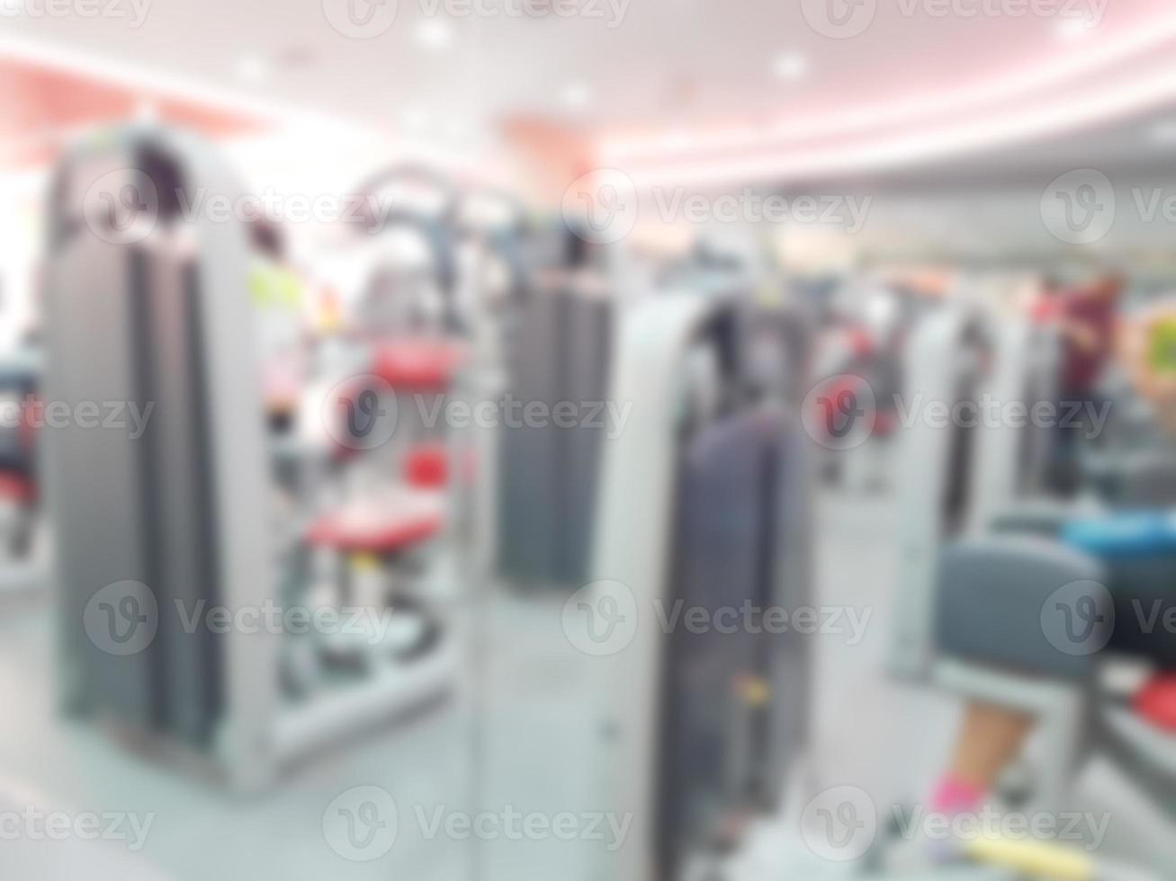 Abstract blur fitness gym equipment background photo