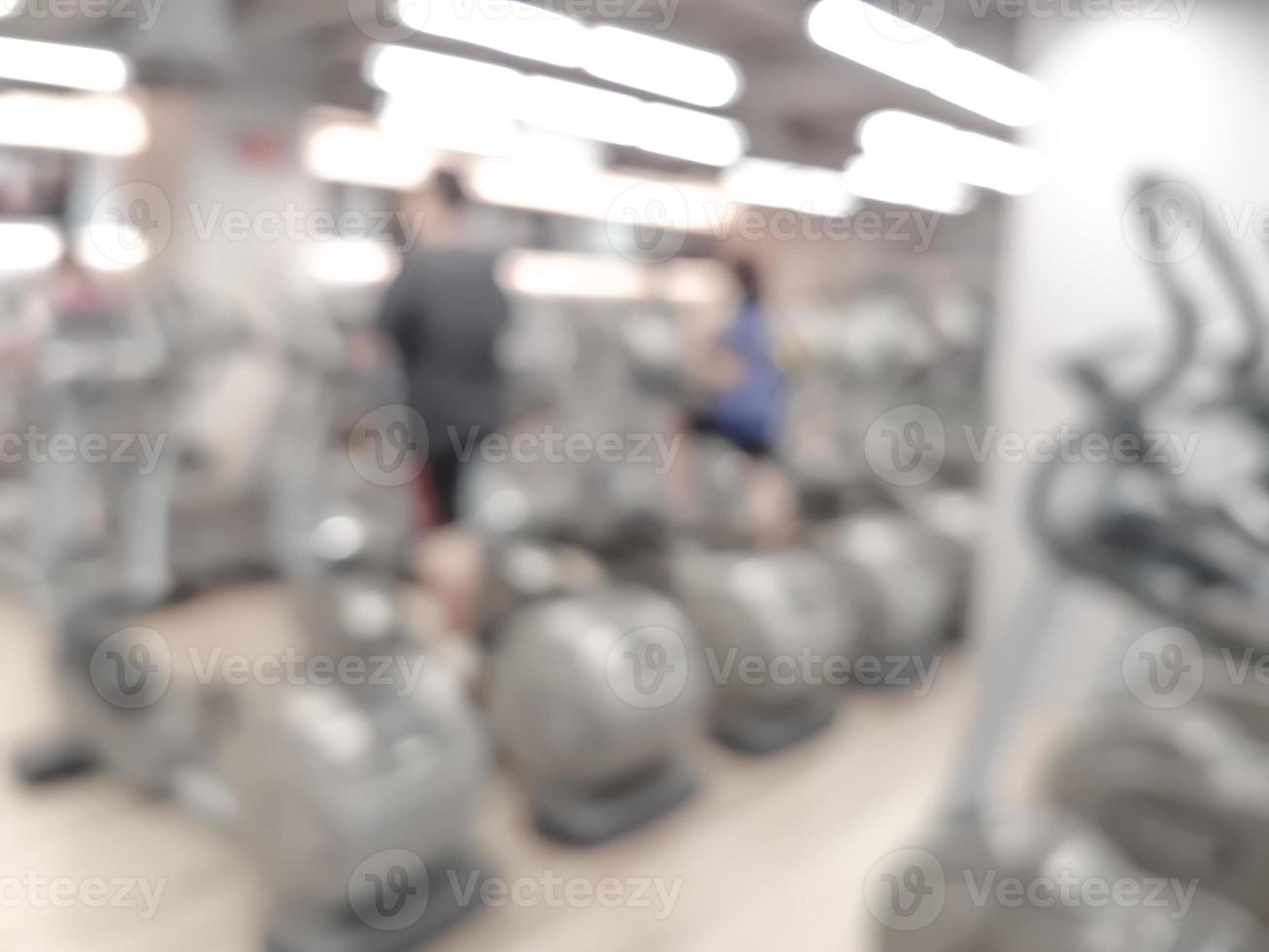 Abstract blur fitness gym equipment background photo