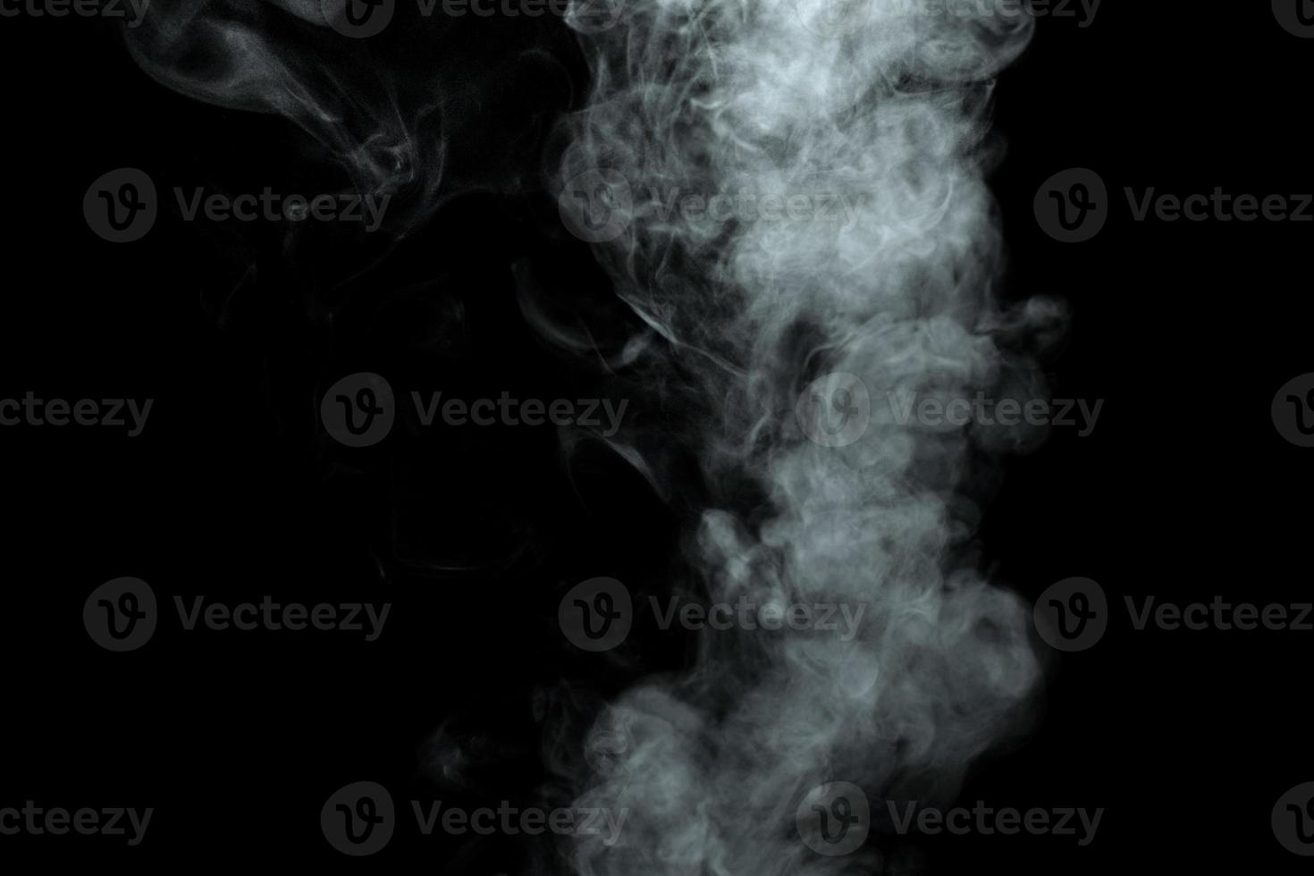 Abstract powder or smoke isolated on black background photo