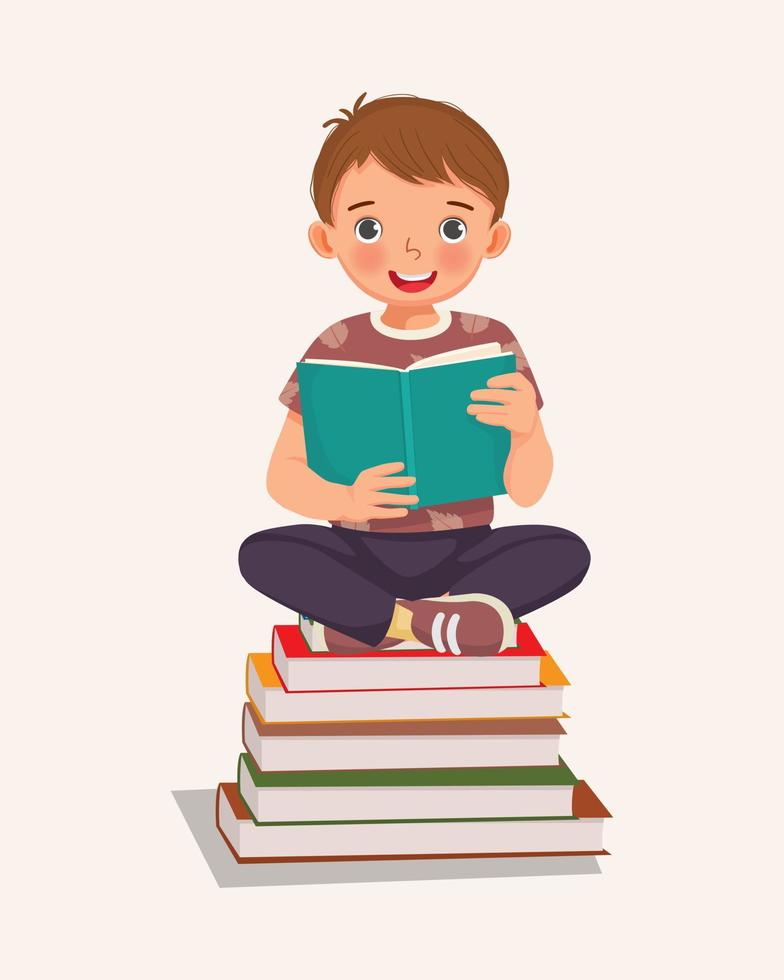 cute little boy student sitting cross legged on stack of books reading vector