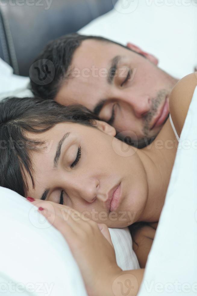 young couple have good time in their bedroom photo