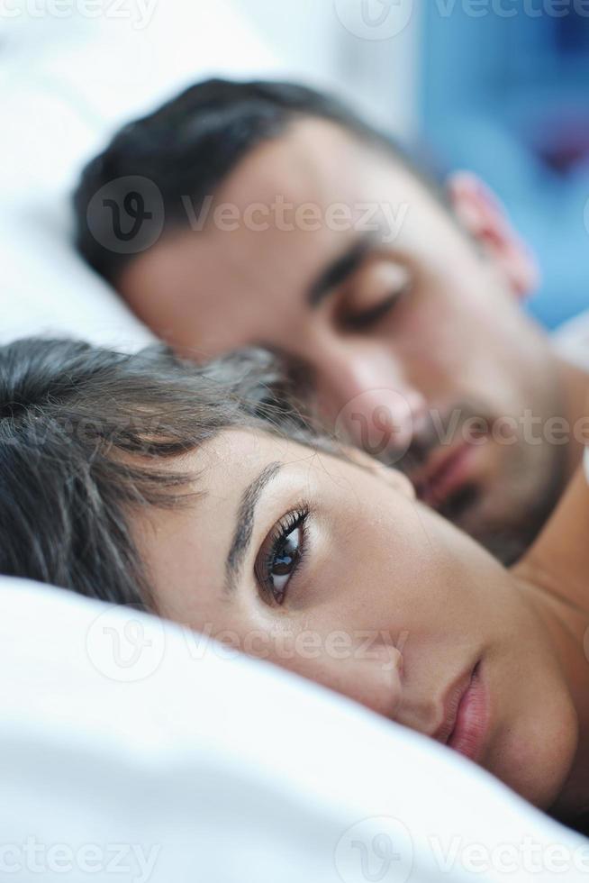 young couple have good time in their bedroom photo