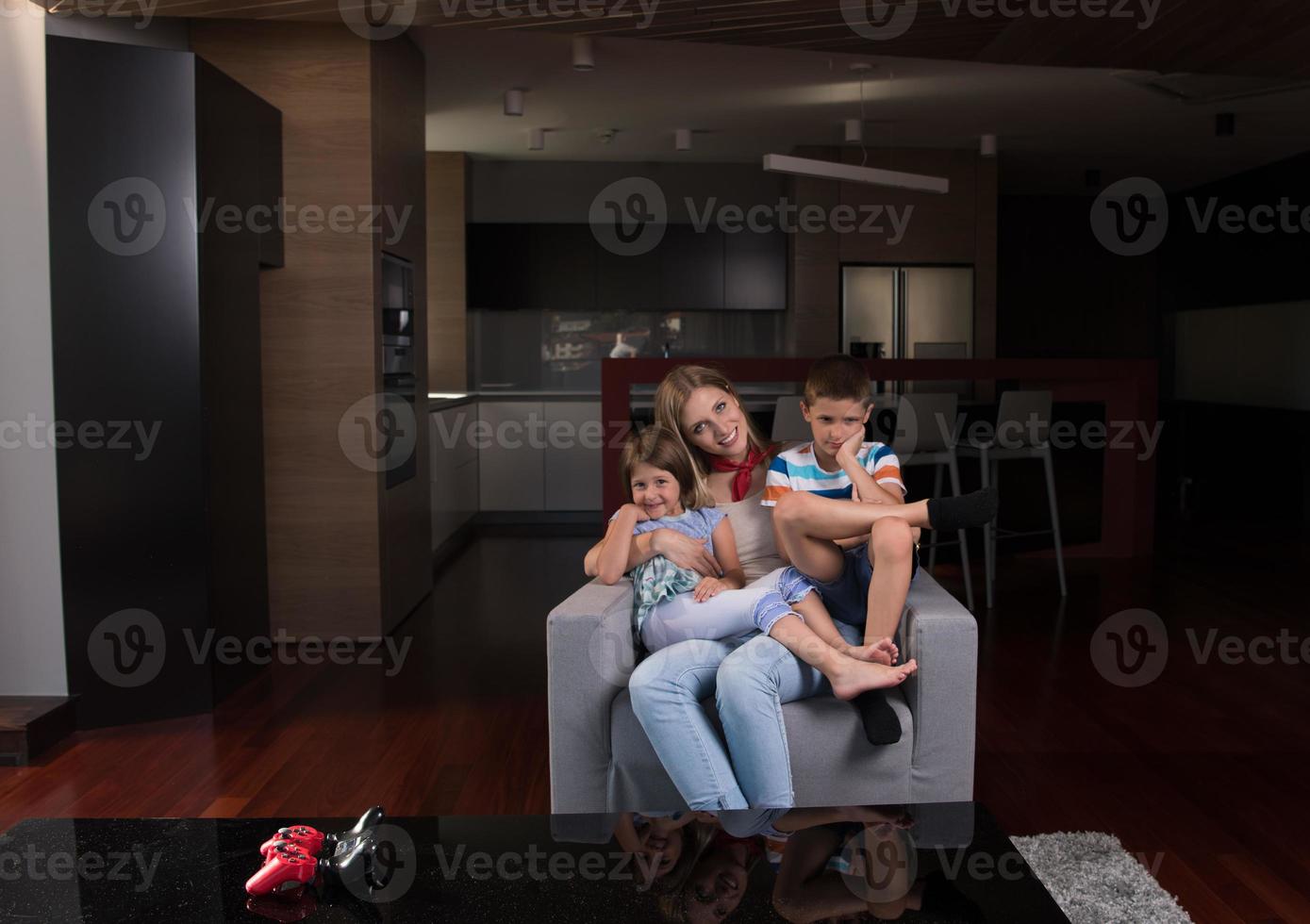 young mother spending time with kids photo