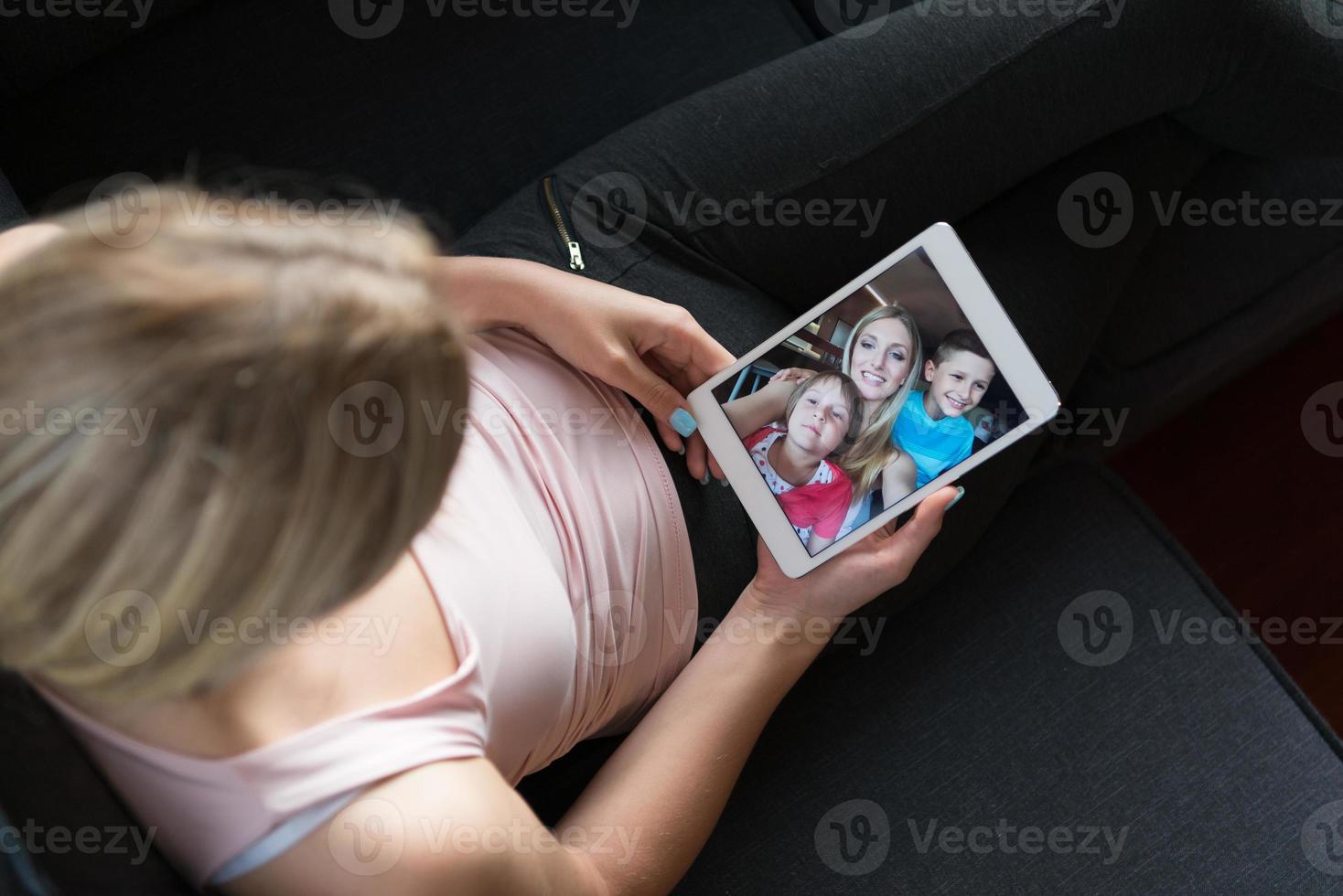 woman using tablet in beautiful apartment photo