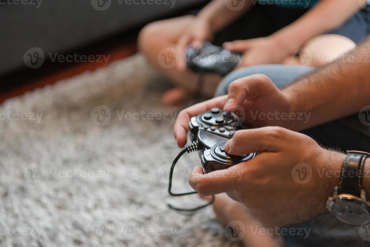 Happy family playing a video game photo