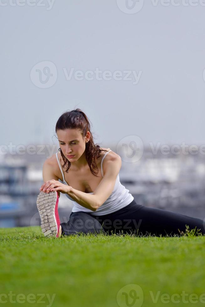 Young beautiful  woman jogging  on morning photo