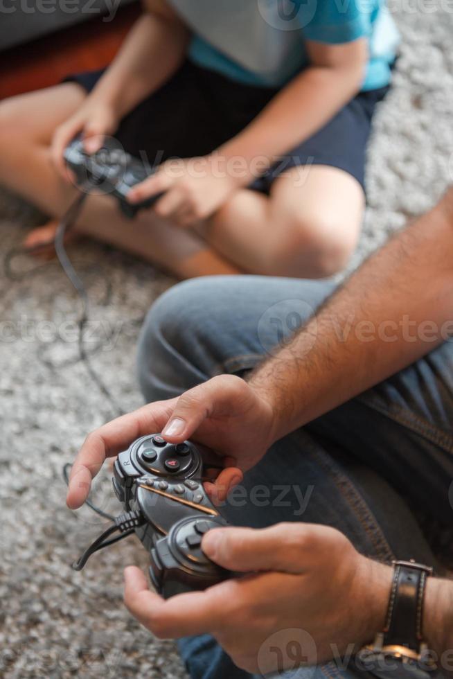 Happy family playing a video game photo