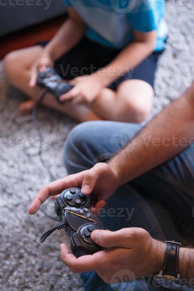 Happy family playing a video game photo