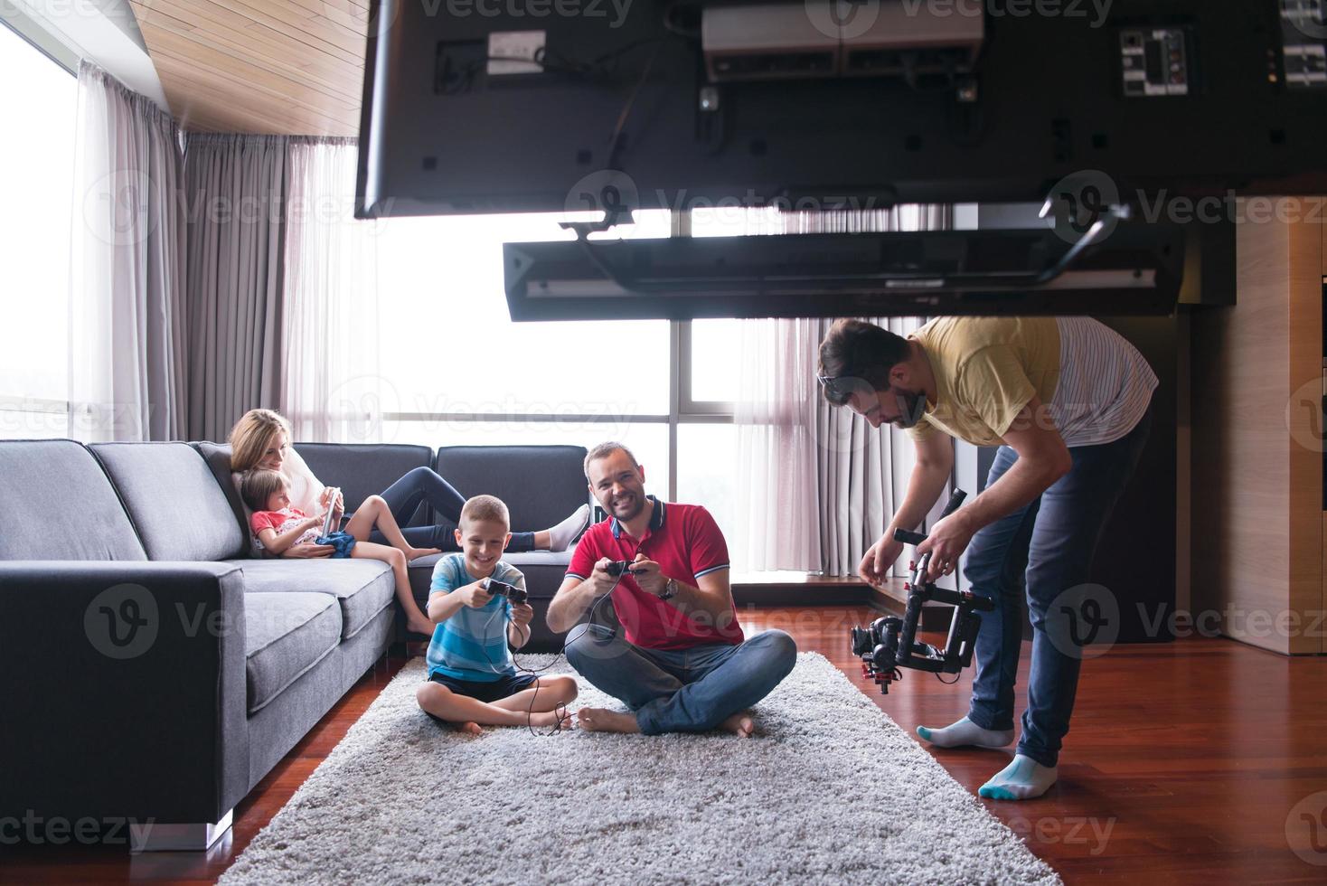 Happy family playing a video game 10801859 Stock Photo at Vecteezy
