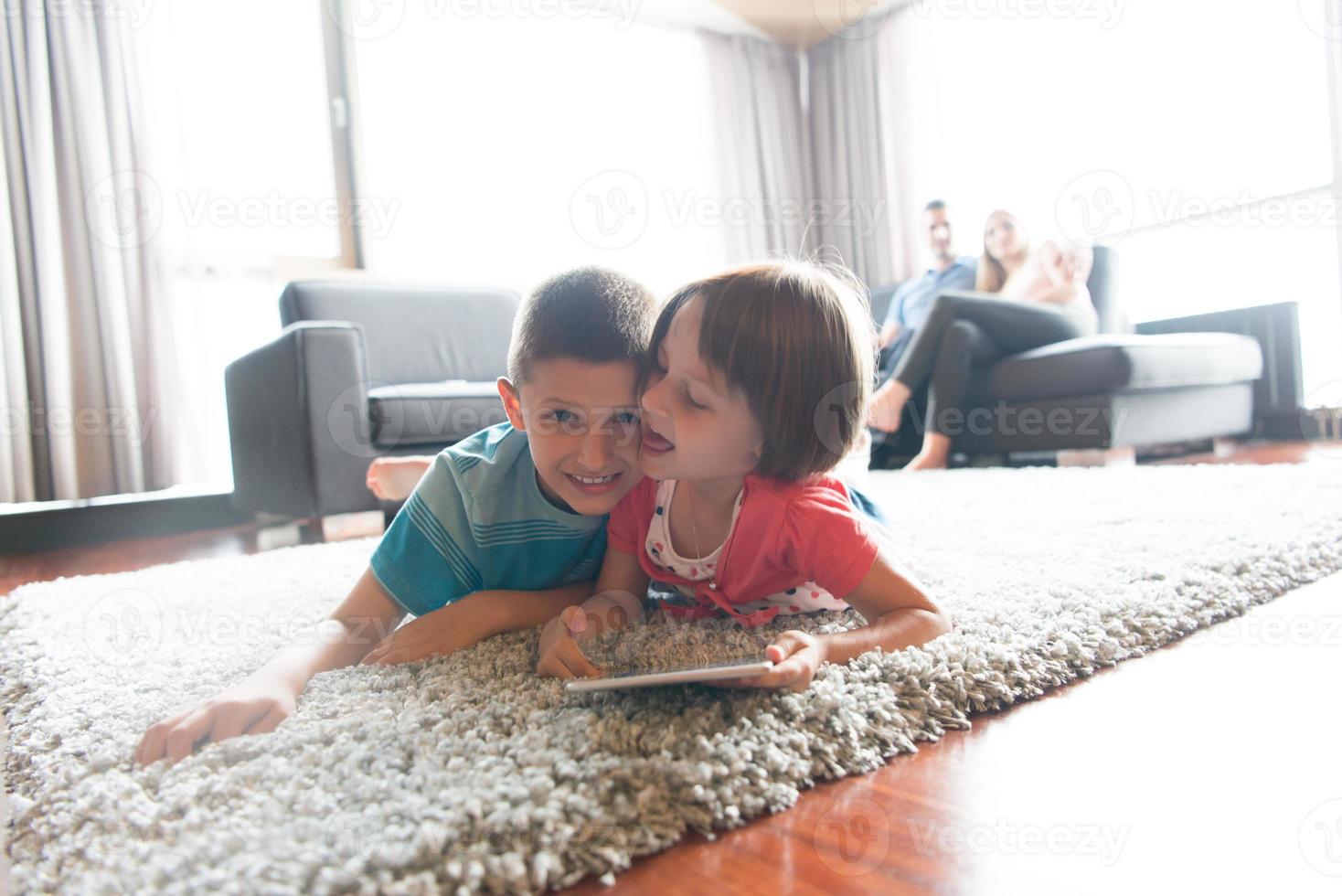 couple spending time with kids photo