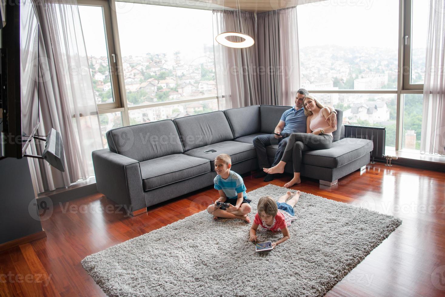 couple spending time with kids photo