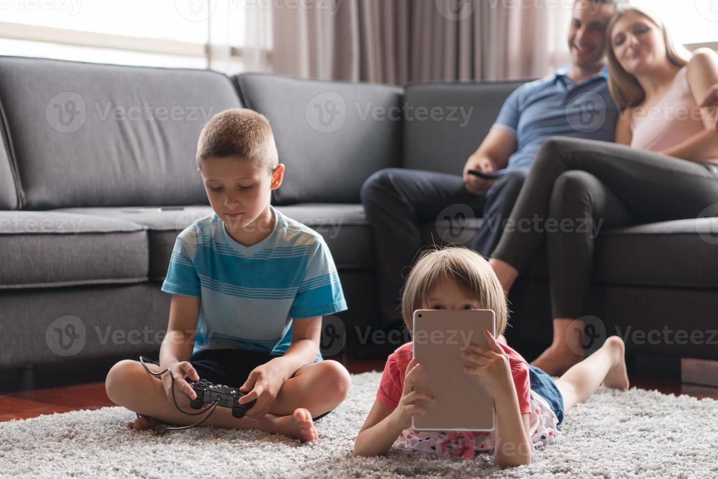 couple spending time with kids photo