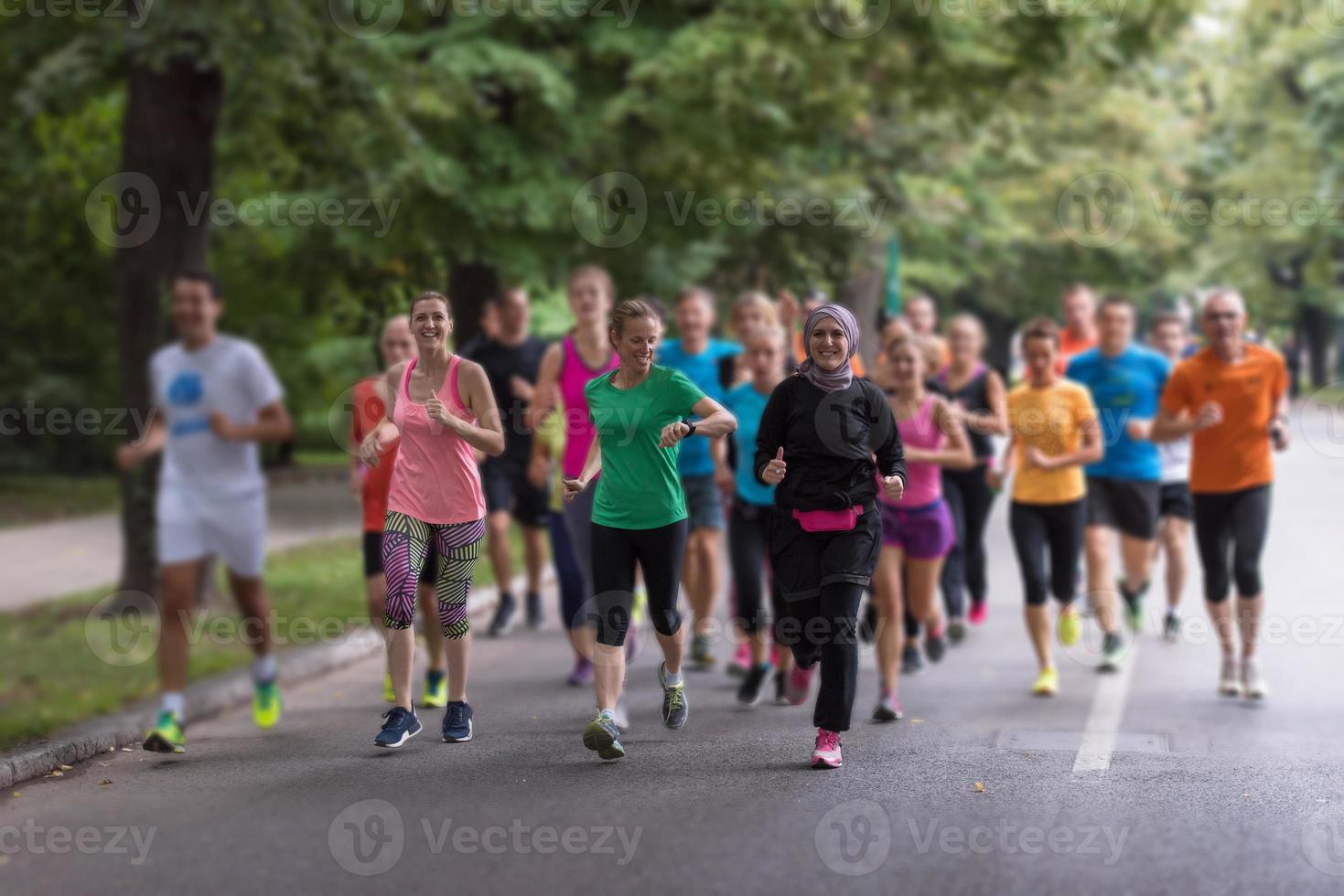 muslim woman with her runners team jogging photo