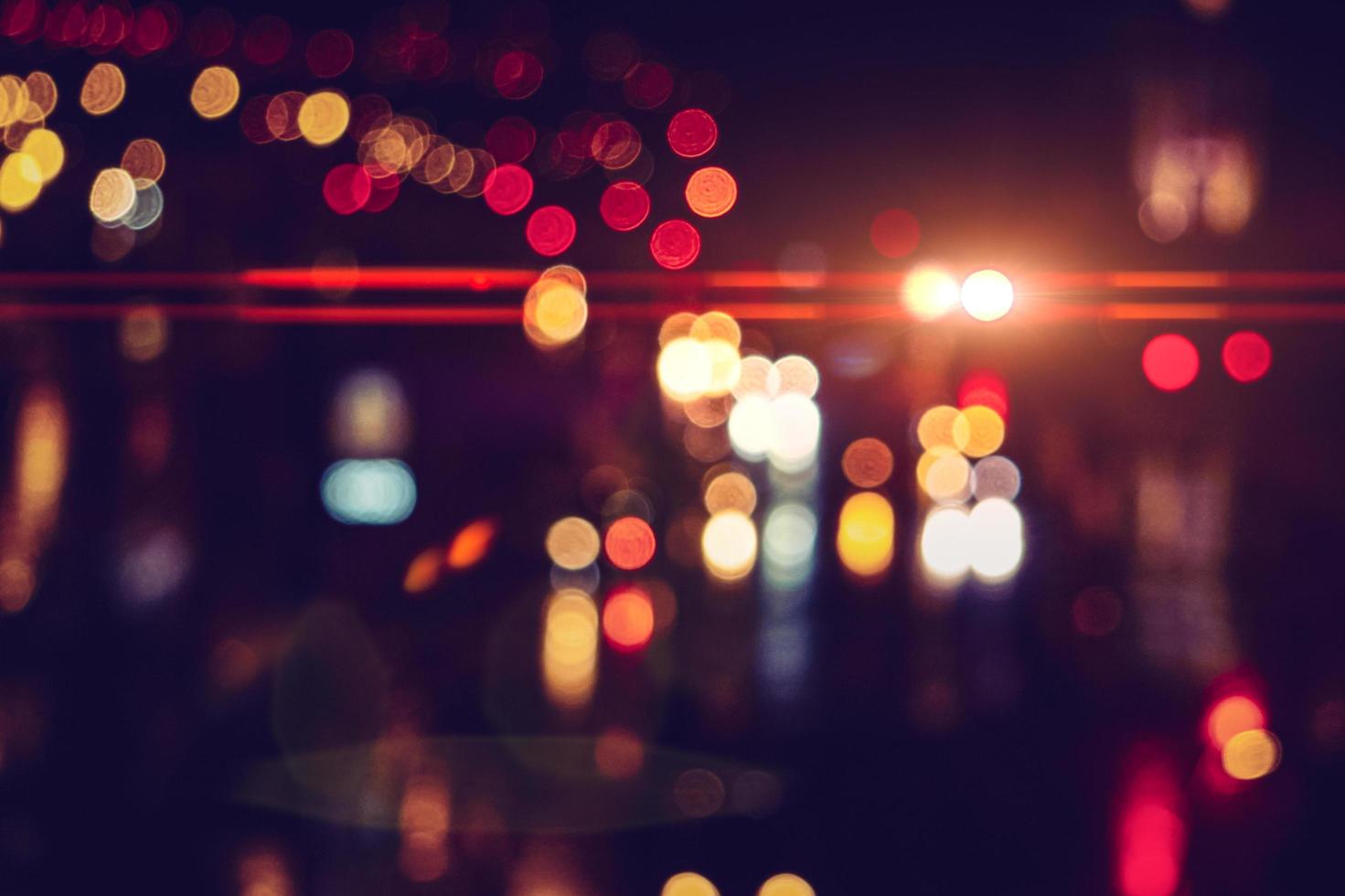 defocused street lights at night on the street photo