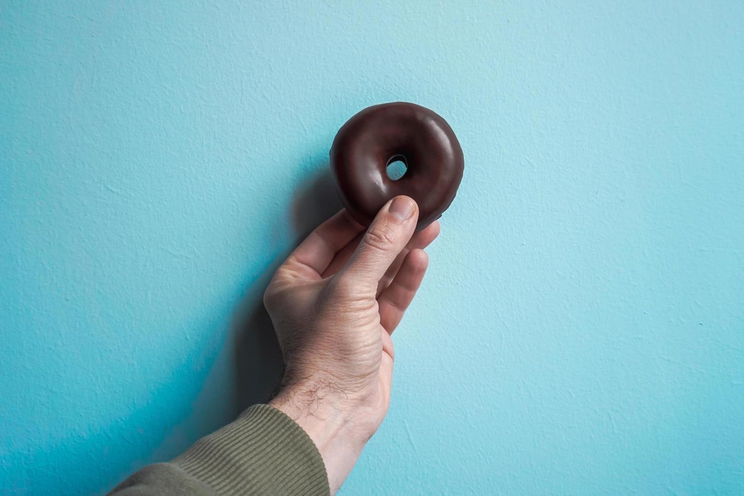 tasty chocolate donut for brunch, unhealthy food photo