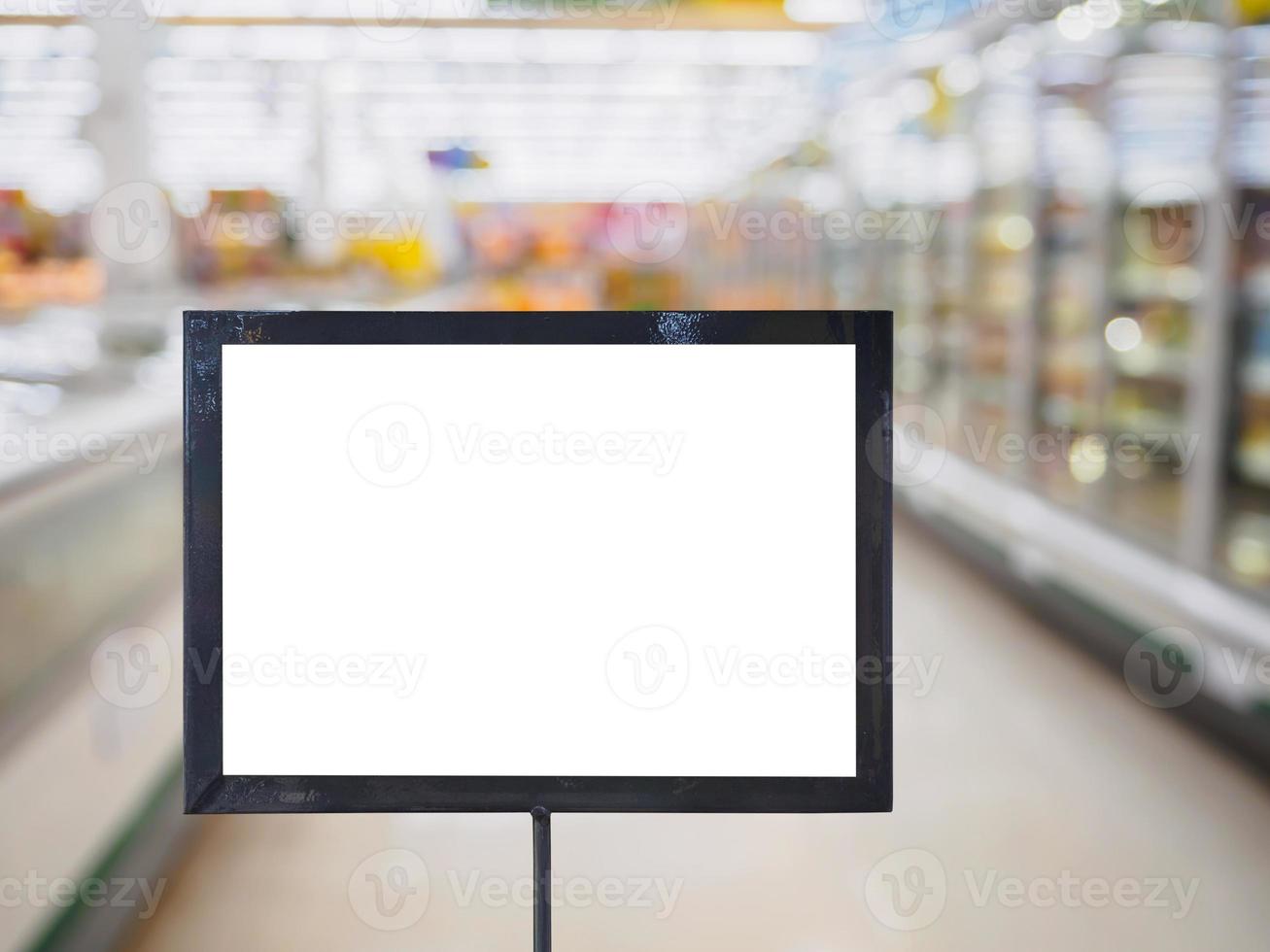 blank board with blur supermarket for background photo