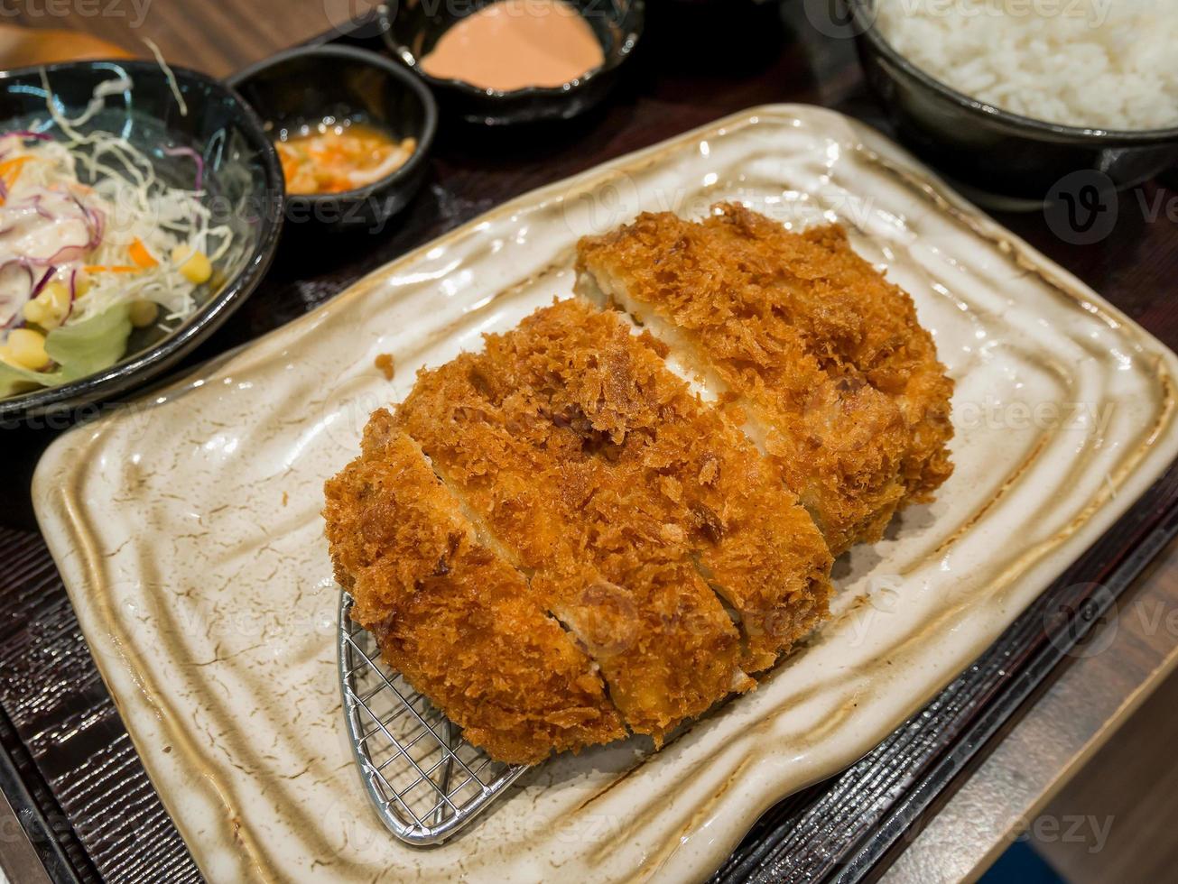 Fried pork cutlet with cheese filling photo