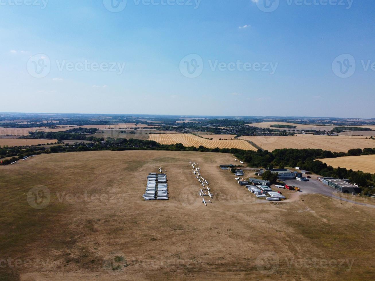 Glider's Airport in the field, High Angle Footage of Drone's Camera. Beautiful Aerial Landscape view of Dunstable Downs England Great Britain photo