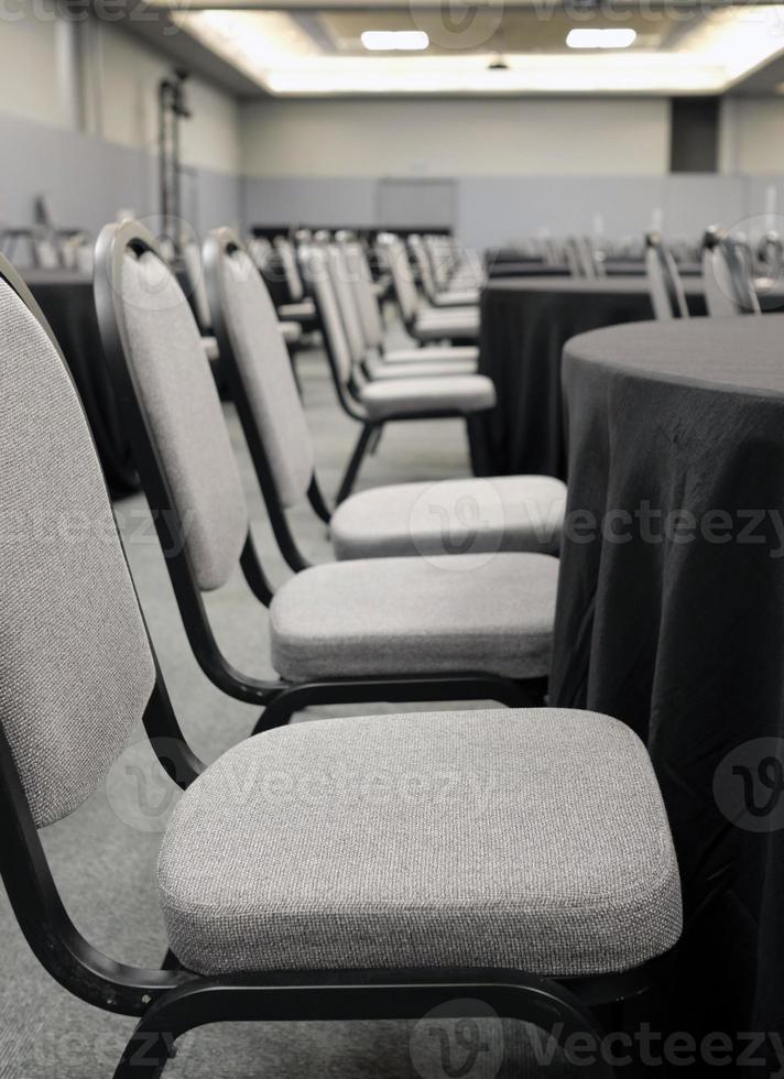 Rows of empty rooms in a big conference room photo