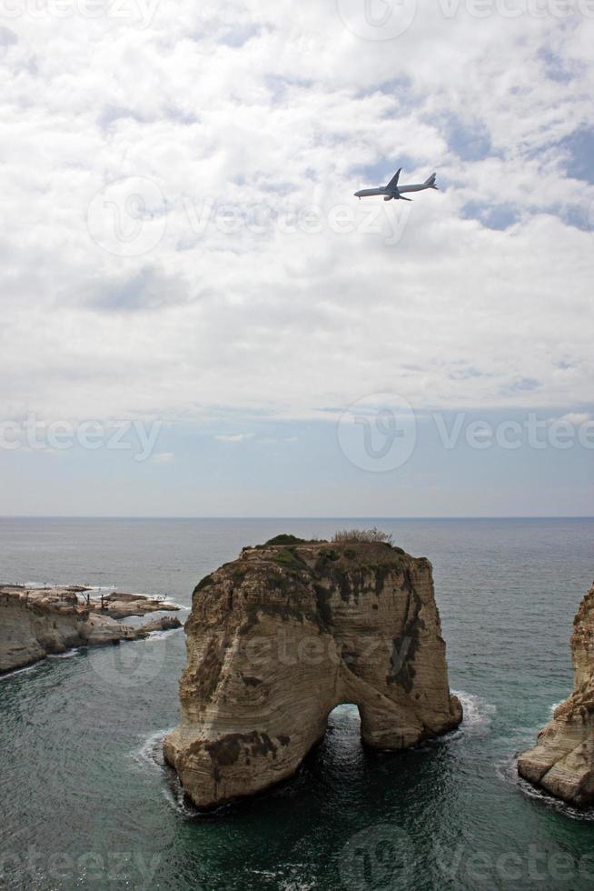 Plane approaching the airport of Beirut, Lebanon, which is situated directly at the coast photo