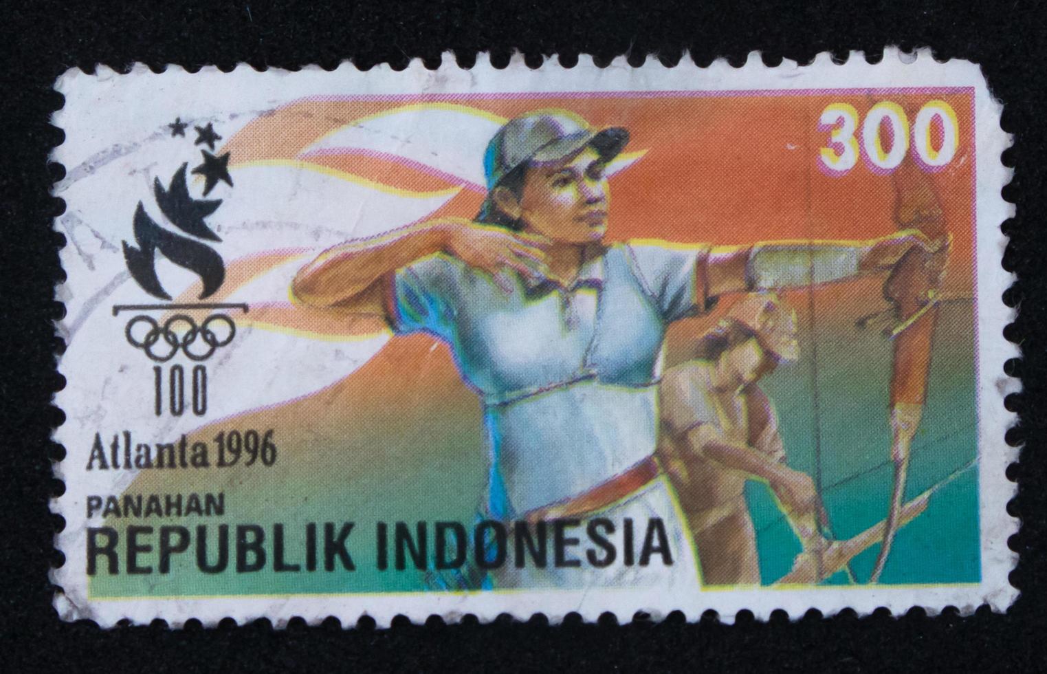 Sidoarjo, Jawa timur, Indonesia, 2022 - philately, a collection of stamps with the theme of a woman participating in the archery atalanta olympics photo