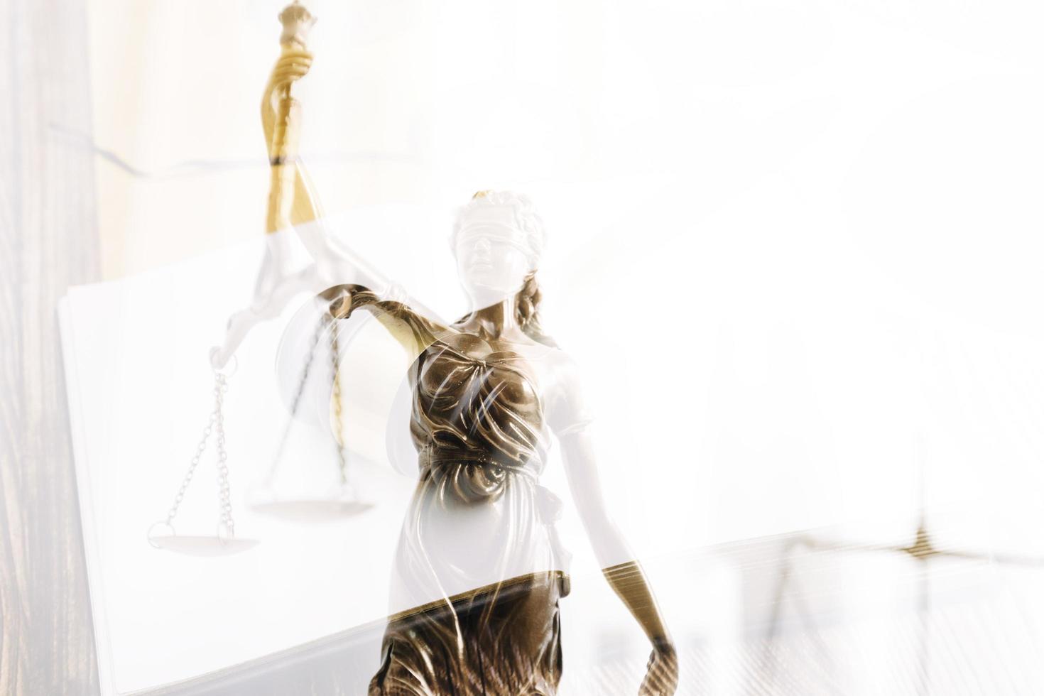 Business and lawyers discussing contract papers with brass scale on desk in office. Law, legal services, advice, justice and law concept picture with film grain effect photo