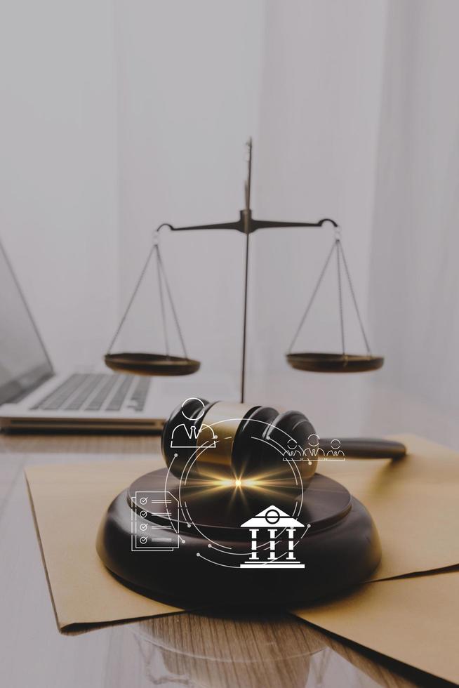 justice and law concept.Male judge in a courtroom on wooden table and Counselor or Male lawyer working in office. Legal law, advice and justice concept. photo