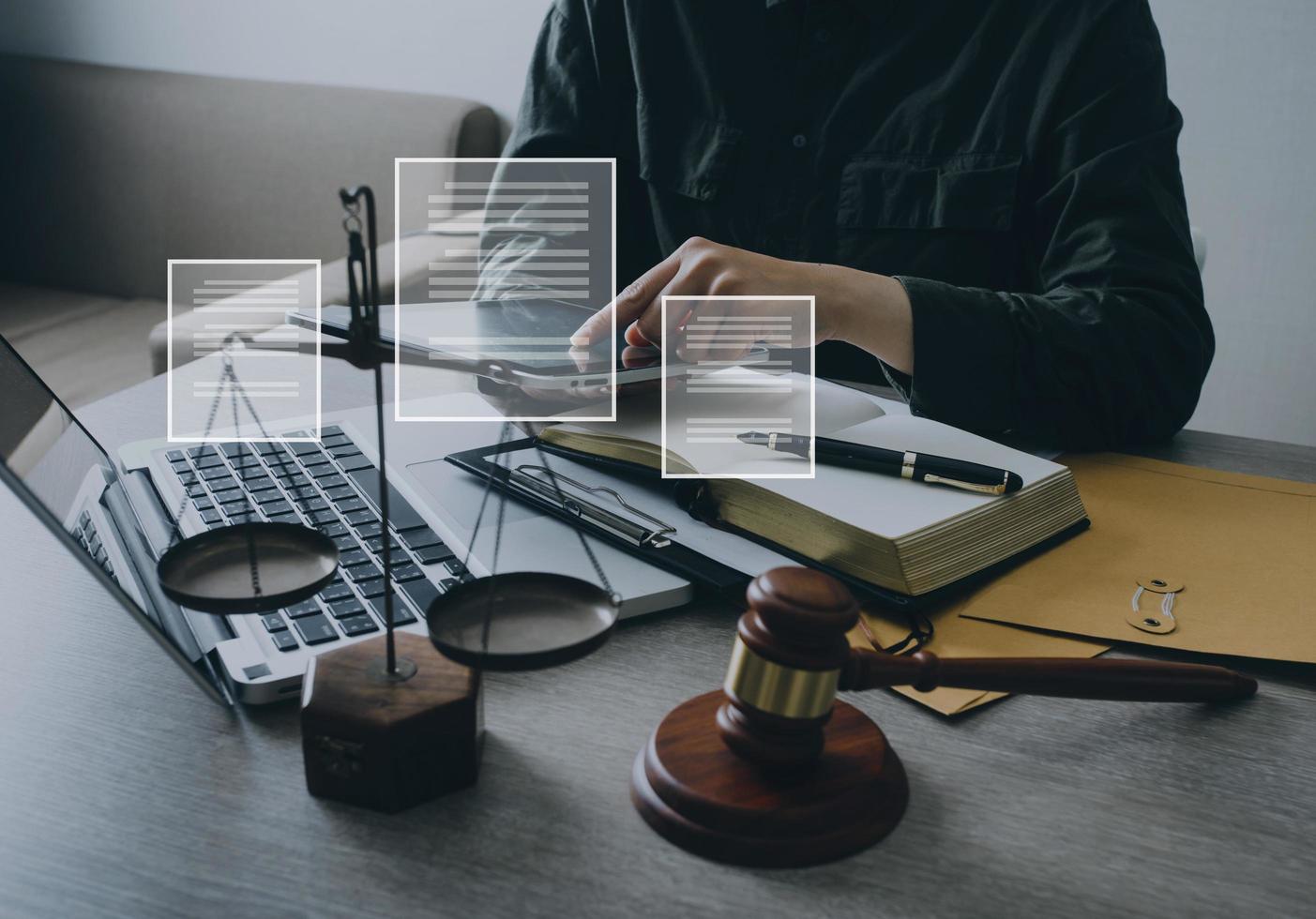 Male lawyer working with contract papers and wooden gavel on tabel in courtroom. justice and law ,attorney, court judge, concept. photo