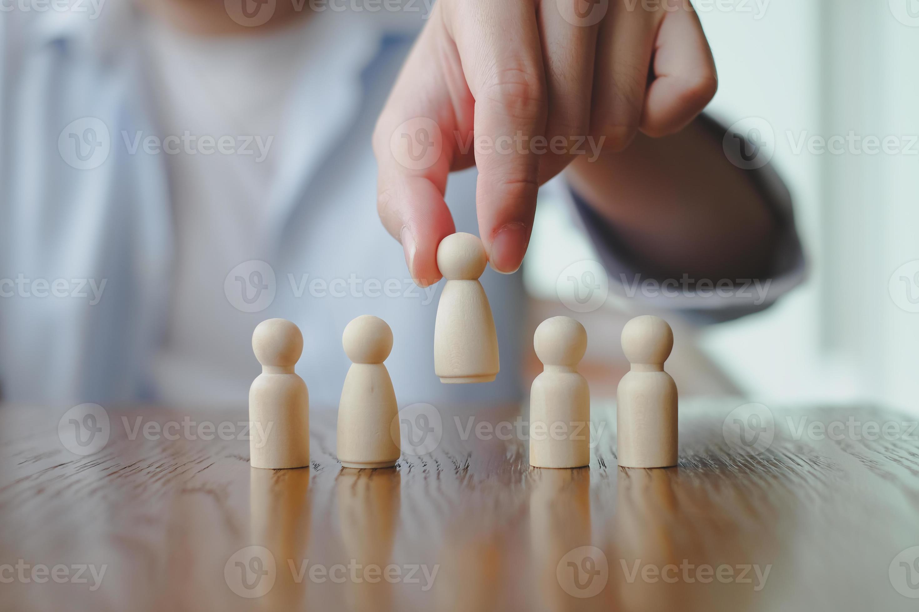 Man Choose figure standing out from the group of crowd. Business hiring