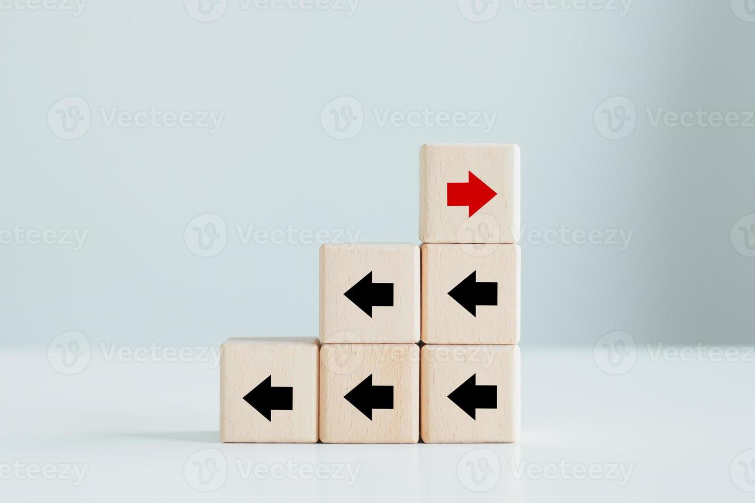 Red arrow has different direction black arrow. Think outside the box. photo