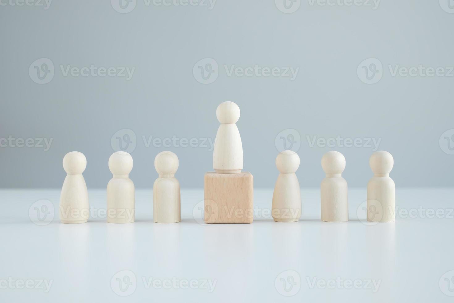 Concept Leader and leadership of the business team. Business improvement, personal development and growth concept. human figure standing out from the crowd. Human resources management. photo
